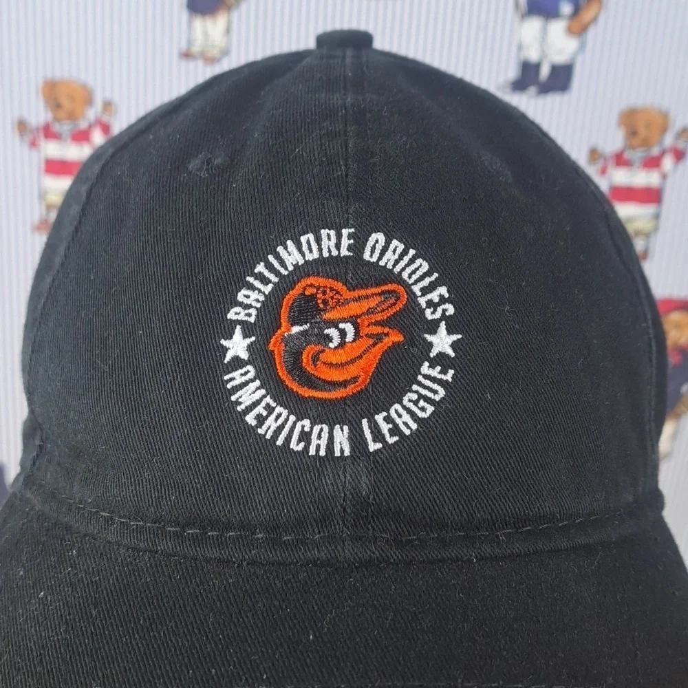 Baltimore Orioles logo MLB New Era 9Twenty Women's soft shell pull tab black hat
